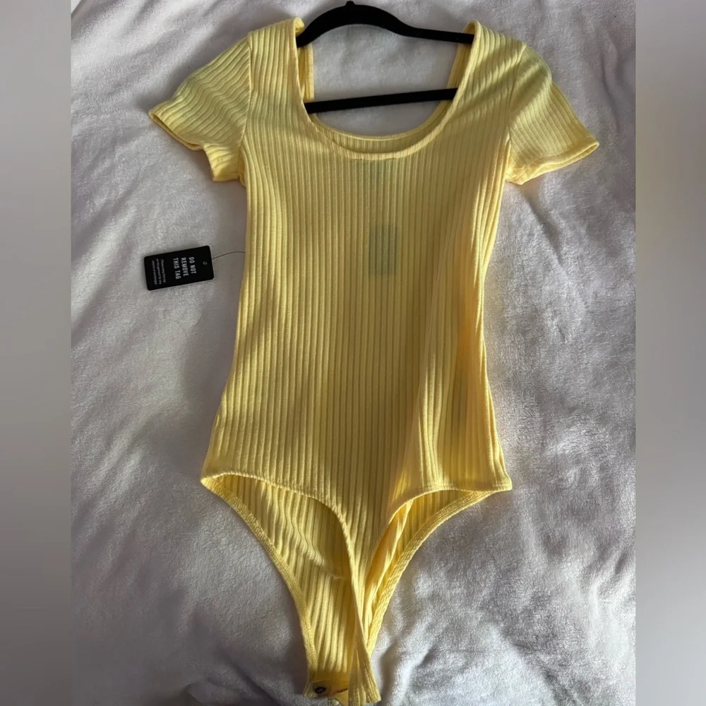 Express women’s Ribbed Short-Sleeve One-Piece Bodysuit in Yellow - Picture 3 of 4